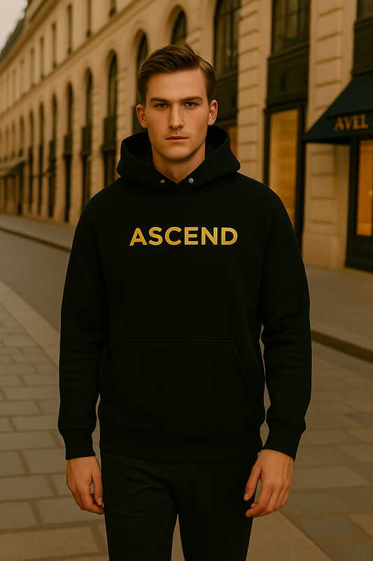 Male model wearing ASCEND black hoodie in Parisian street, styled by Desmond & Florence